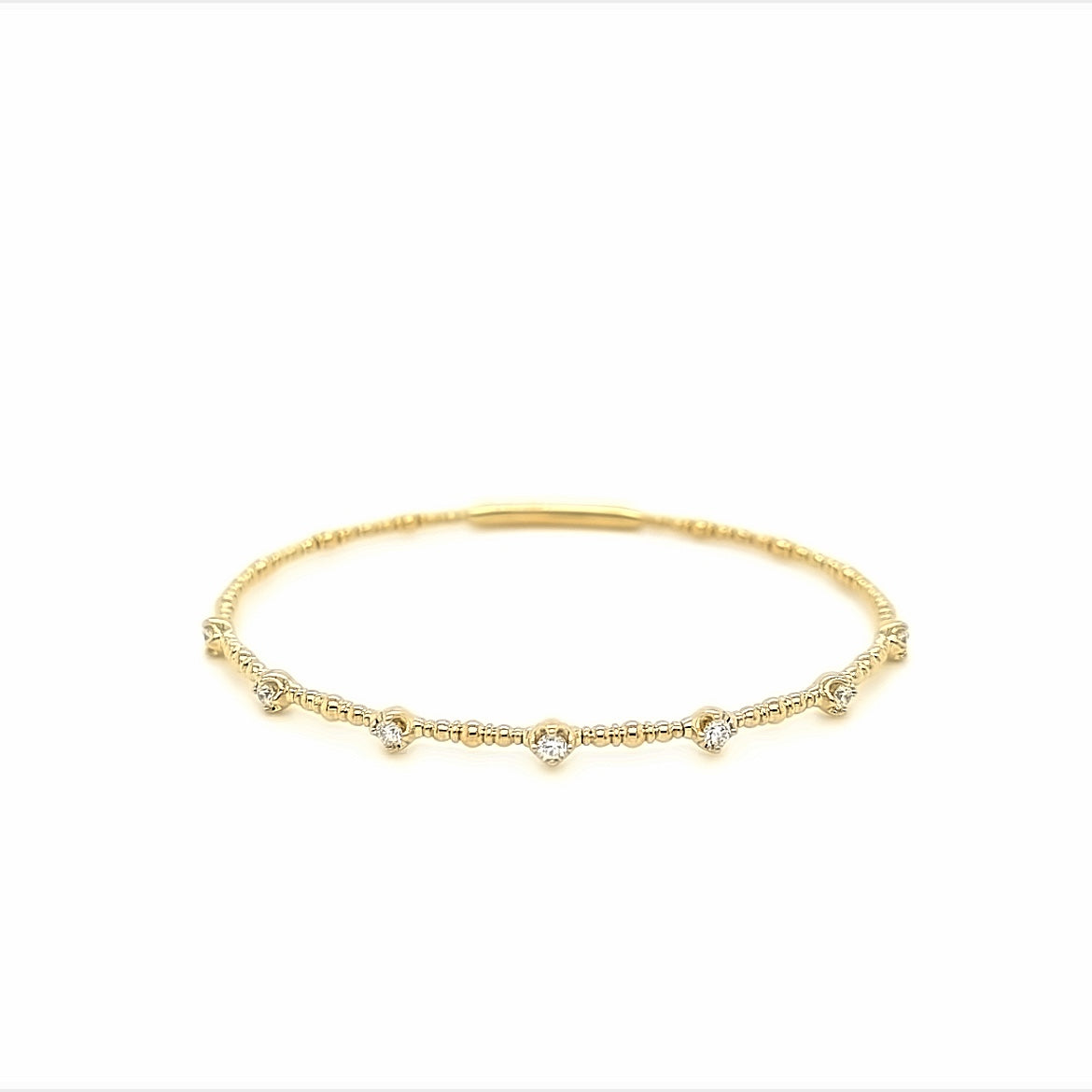 14k yellow gold 7 round diamond station bangle