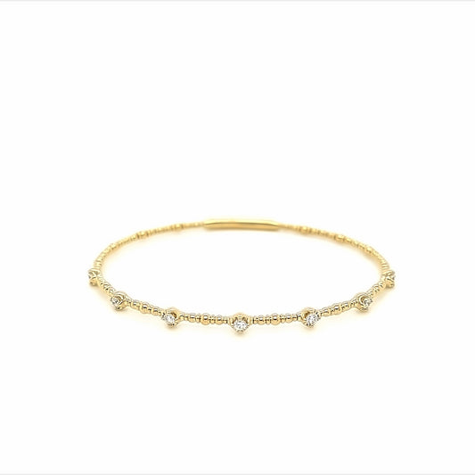 14k yellow gold 7 round diamond station bangle