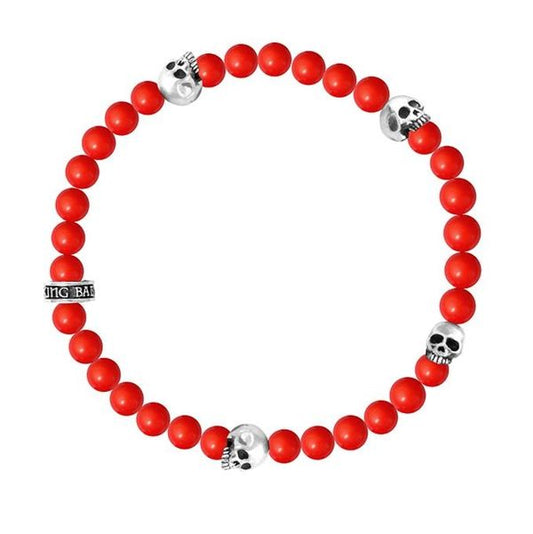 6MM RED CORAL BEAD BRACELET WITH 4 SKULLS
