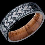 7 mm wide/Flat/Tantalum band with a laser carved Maori pattern also featuring a Koa sleeve.