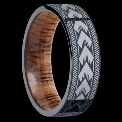 7 mm wide/Flat/Tantalum band with a laser carved Maori pattern also featuring a Koa sleeve.