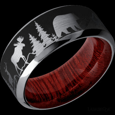 9 mm wide/High Bevel/Tantalum band with a laser carved Bear Moose Deer Mountain pattern also featuring a Blood Wood sleeve.