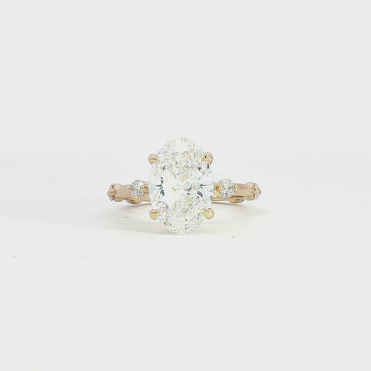 Custom 14K Yellow Gold Oval Diamond Round Station Engagment Ring